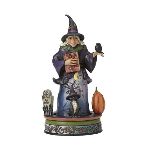 Shocking Incident: Halloween Witch Figurine Collides with Tree Décor